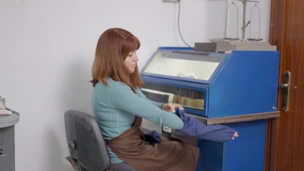 Female Artisan Puts Arm Cover Sleeves Protection Pet Jewelry Workshop — Stock videók