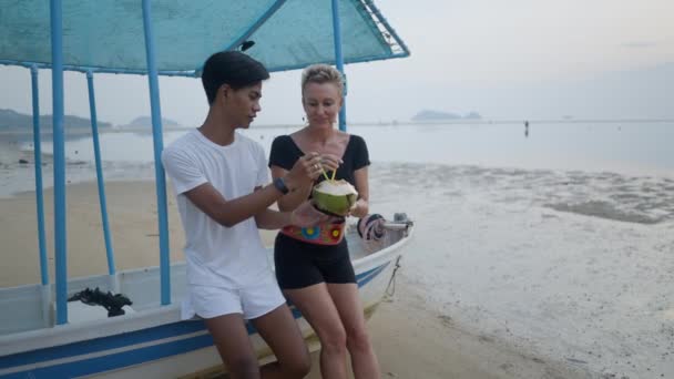 Happy Interracial Couple Age Differences Drinking Coconut Water Together Sea — Vídeos de Stock