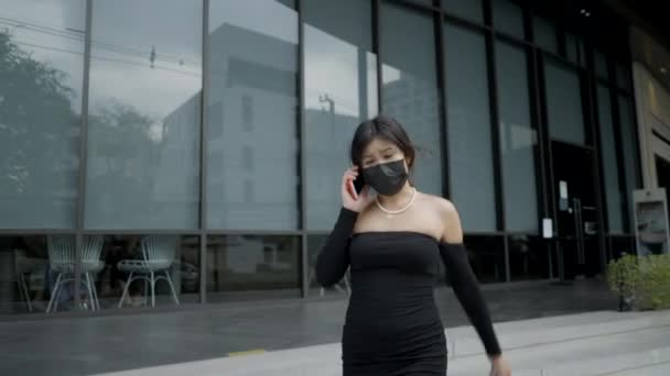 Sad Woman Wearing Black Medical Mask Talking Mobile Phone Horizontal — Stockvideo