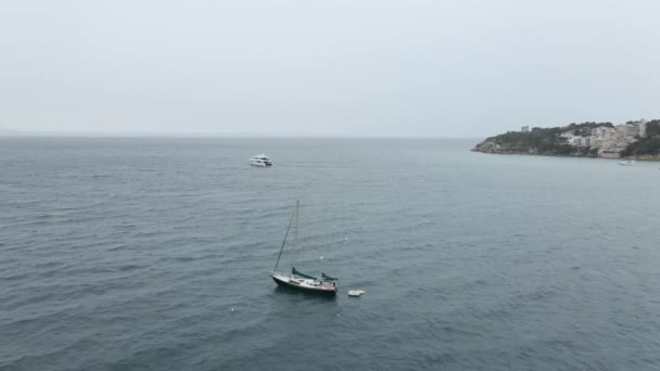 Sailboat Catamaran Floating Ocean Chilly Overcast Day Mallorca Spain Aerial — Video Stock