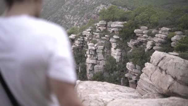 Young Explorer Walking Cliff Film Aerial Shot Horizontal Video — Vídeo de stock