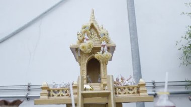 Traditional Thai Spirit House In Bangkok, Thailand. Pullback Shot - 4K Horizontal video