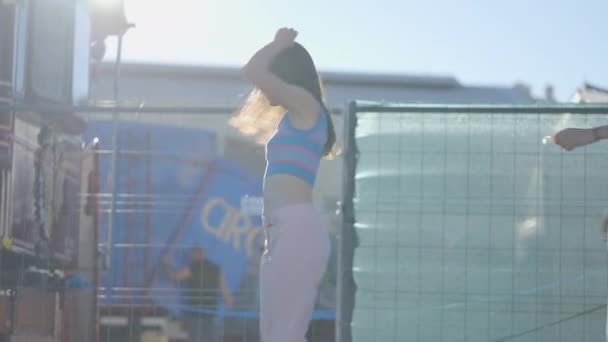 Young Dark Haired Women Spin Roller Skates Sunlight Horizontal Video — Αρχείο Βίντεο