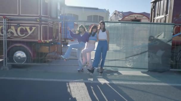 Push Three Happy Girls Roller Skates Standing Metal Fence Horizontal — Video