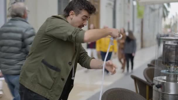 Illusionist Showing Tricks Street Rope Caucasian Magician Man Holding Rope — Wideo stockowe