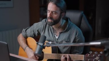Attractive songwriter performing an online concert because of the covid19 pandemic - Close up shot