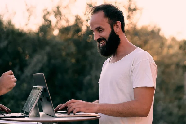 A young entrepreneur man having an online business chat with its tablet - Businessman concept