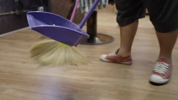 Commercial Video Man Sweeping Floor Broom Wearing Disposable Masks Gloves — 图库视频影像
