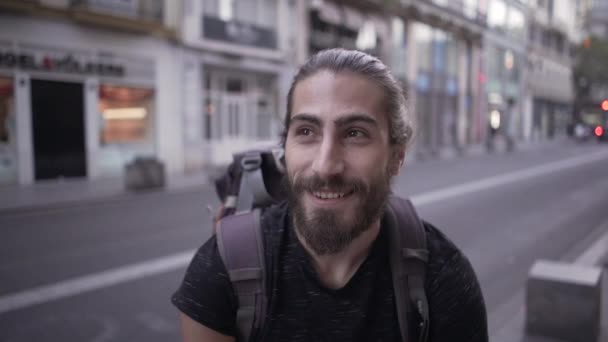 Playful Young Backpacker Winks Makes Tongue Gestures Camera Horizonal Video — Video