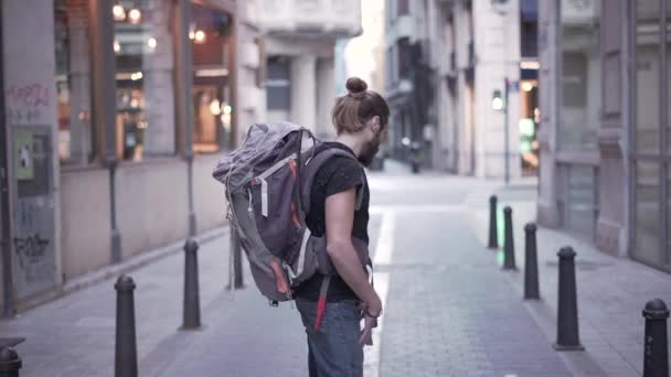 Young Explorer Lost City Looks Camera Turns His Back Walks — Video