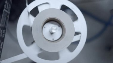 Label Plate Rolling During Labeling Of Cans In A Beer Factory. close up - 4K Horizontal video