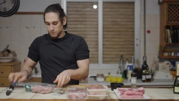 Young Caucasian Man Enjoying Smell Raw Meat Opening Tray Knife — Stock video