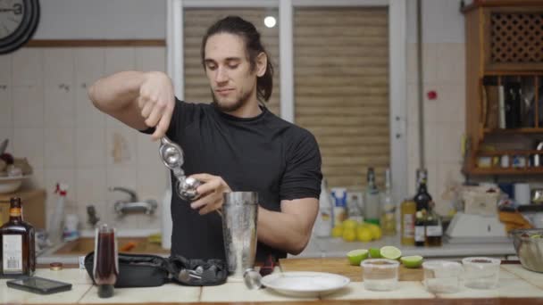 Focused Barman Squeezing Limes Cocktail Juice Kitchen Countertop Horizontal Video — Stock video
