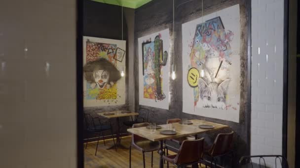 Push Colorful Artwork Walls Tables Cozy Restaurant Horizontal Video — ストック動画