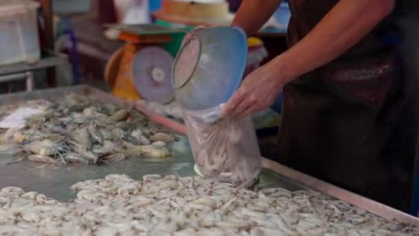 Man Putting Shrimp Plastic Bag Weight Sell Asian Street Market — Video Stock