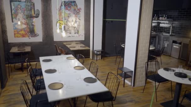 Pan Interior Modern Restaurant Owner Sits Alone Table Horizontal Video — Vídeo de Stock
