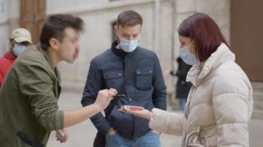 Magician man showing street magic trick with cards. The magicians hands. Man showing trick with playing cards - 4K Horizontal video