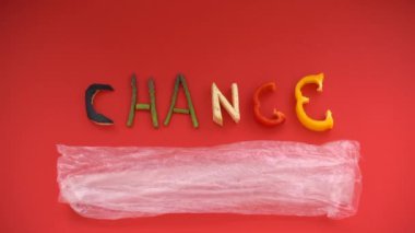 word CHANGE formed with chopped vegetables against climate change and plastics - Horizontal video