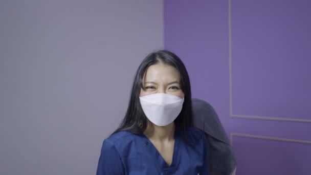 Thai Doctor Wearing Eye Lenses Smiles Looks Camera Close Horizontal — Vídeo de Stock