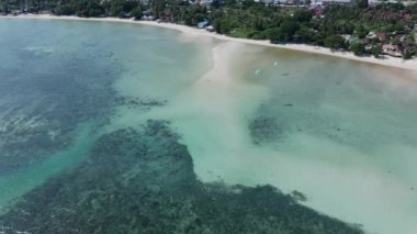 Paragliding Adventure In Tropical Beach Island In Ko Pha Ngan In Southeast Thailand. Aerial Drone Shot - 4K Horizontal video