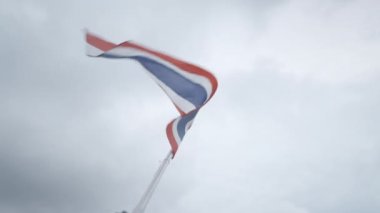 National Flag Of Thailand Waving In The Wind On A Gloomy Day. - low angle - 4K Horizontal video