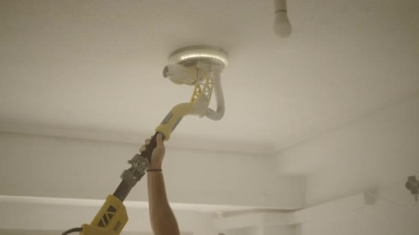 Hands Unrecognizable Man Sanding Ceiling His House Horizontal Video — Stock Video