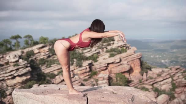 Unrecognizable Woman Doing Stretching Exercise Peak Mountain Cloudy Sky Background — Stock Video
