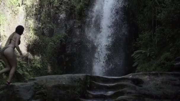 Caucasian Woman Walks Rocks Waterfall Kaiate Falls Slow Motion Horizontal — Stock Video