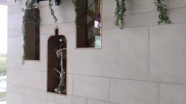 white ceramic window with a mirror and a glass of water, outdoor