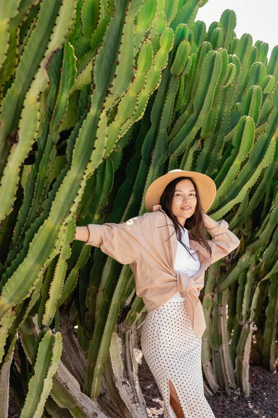 Pleased Woman Looking Camera Green Giant Succulents — 스톡 사진
