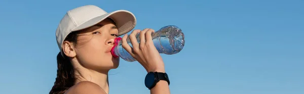 Sportive Woman Baseball Cap Drinking Refreshing Water Blue Sky Banner — Stock Photo, Image