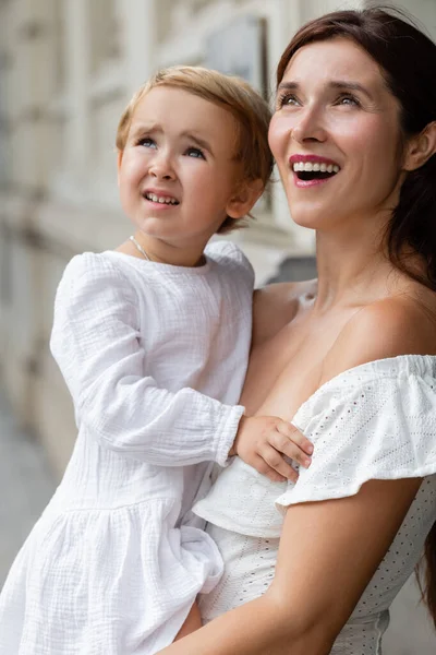 Portrait Excited Mom Holding Focused Baby Girl Outdoors Valencia — Fotografia de Stock