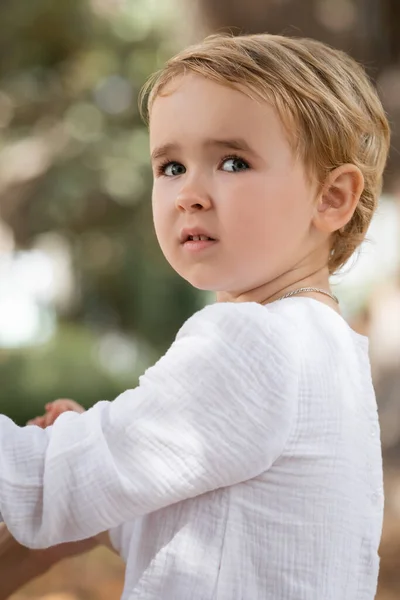 Portrait Toddler Girl Shite Dress Looking Away Outdoors — Zdjęcie stockowe