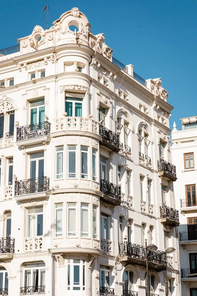 White building with stucco decor in valencia, spain — стоковое фото