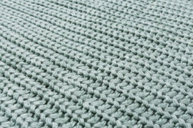 Büyük örgü kumaş, mavi-yeşil pastel renk, köşegen düzenleme, makro fotoğraf, seçici odak