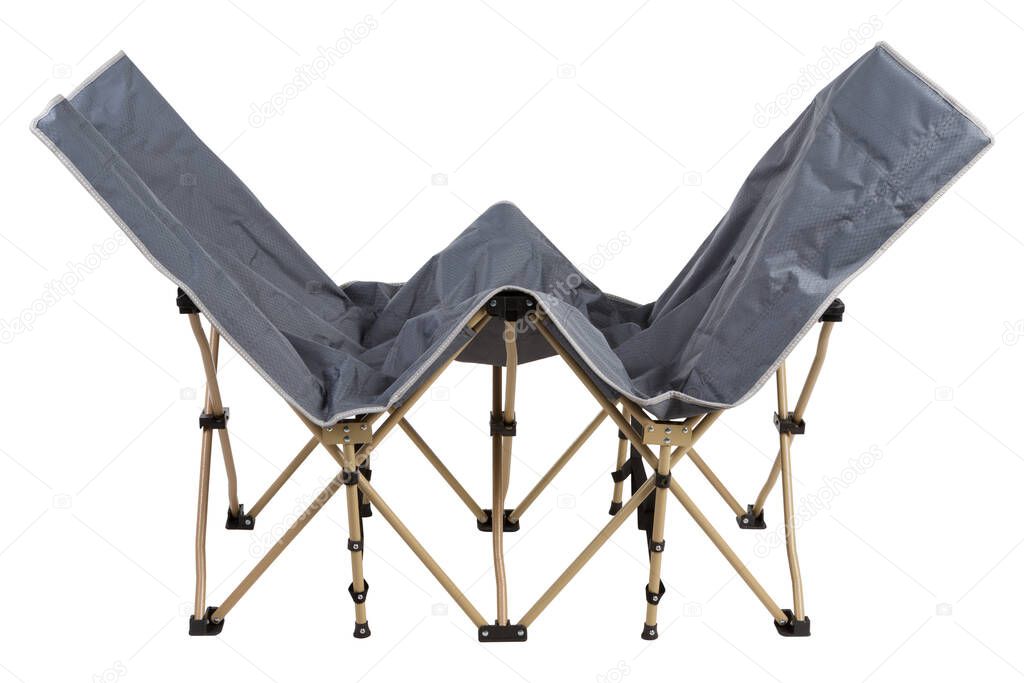 light folding bed for camping and travel, in the process of unfolding, on a white background, isolate