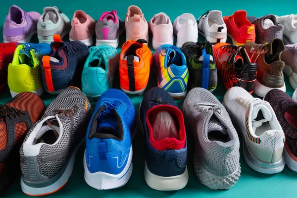 Many Colored Sports Shoes Sneakers Soccer Shoes Stand Three Rows — Stock Photo, Image