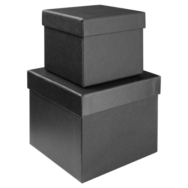 Dvě Černé Dárkové Krabice Jsou Naskládány Jedna Druhé Bílém Pozadí — Stock fotografie