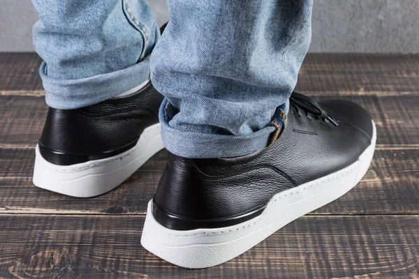 Male Feet Black Leather Shoes White Soles Reverse Side Diagonal — Stock Photo, Image