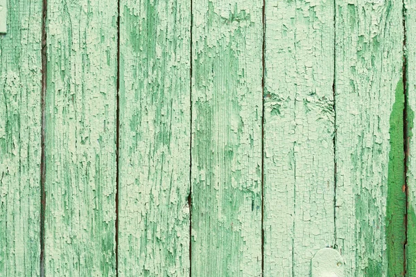 Çatlak boyalı, çatlak ve çizikli eski ahşap doku, grunge yakın çekim