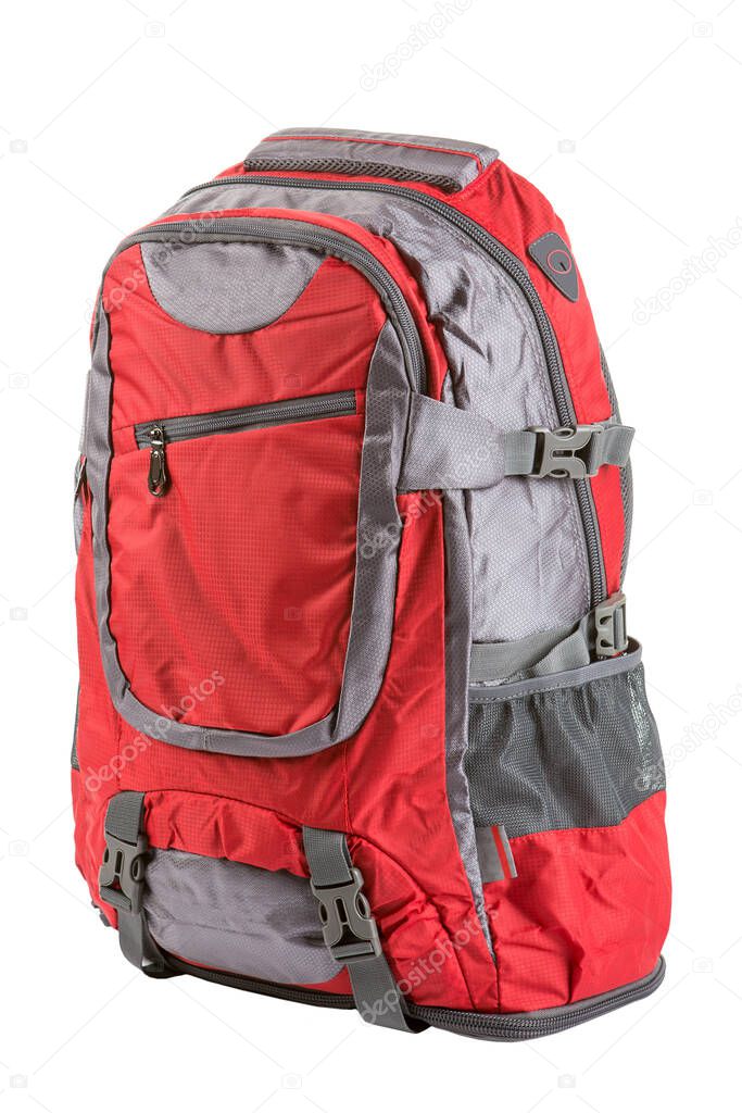 red backpack medium size for a hike and for travel, on a white background