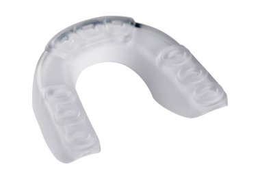 white sports mouth guard, protection of teeth in box of rubber on white background