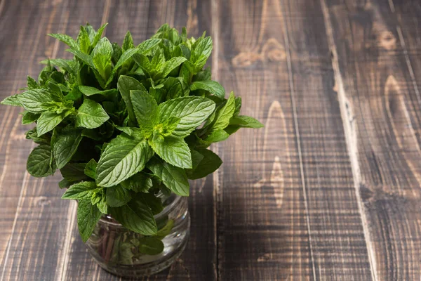 Bunch Fresh Mint Glass Jar Wooden Table — Stok Foto