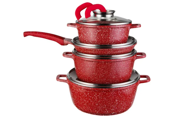 Modern Set Dishes Three Red Pots One Frying Pan Stands — стоковое фото