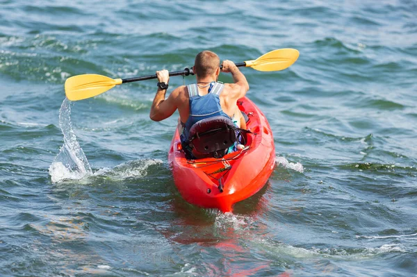 Man Swims Red Kayak Paddles Splash Water Lifestyle Concept — Stock Photo, Image