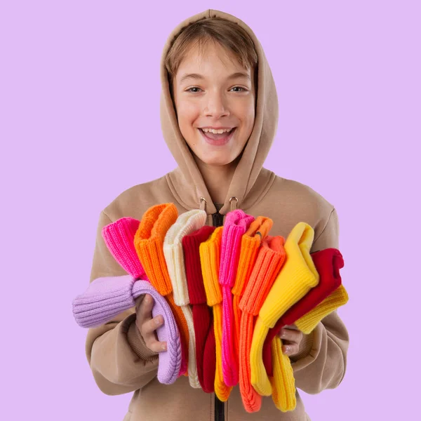 Happy Laughing Boy Brown Sweatshirt Stack Many Colored Knitted Hats — 스톡 사진