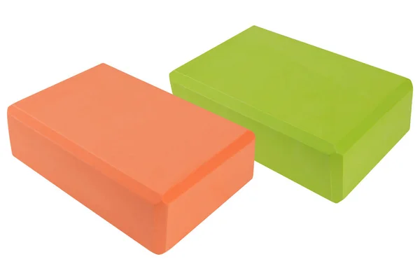 Two Colored Yoga Blocks Green Orange White Background Isolate — Fotografia de Stock