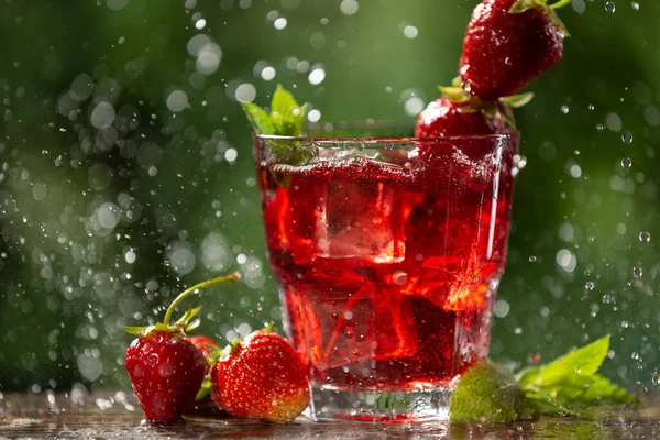 Glass Red Drink Strawberries Mint Ice Cubes Backlight Water Drops — Stock Photo, Image