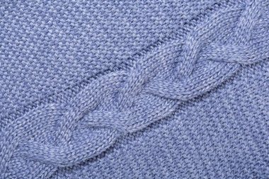 Yakın çekim desenli mavi örgü örülmüş kumaş, çapraz örgülü konsept.