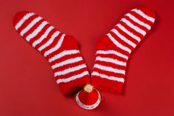 Pair Striped Christmas Socks Small Santa Hat Lying Elk Antlers — Stock Photo, Image